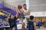Lemoore's Joemyl Ragunton is seen here in earlier season action. The Tigers lost recently to Clovis High School in the Holiday Invitational Tournament.